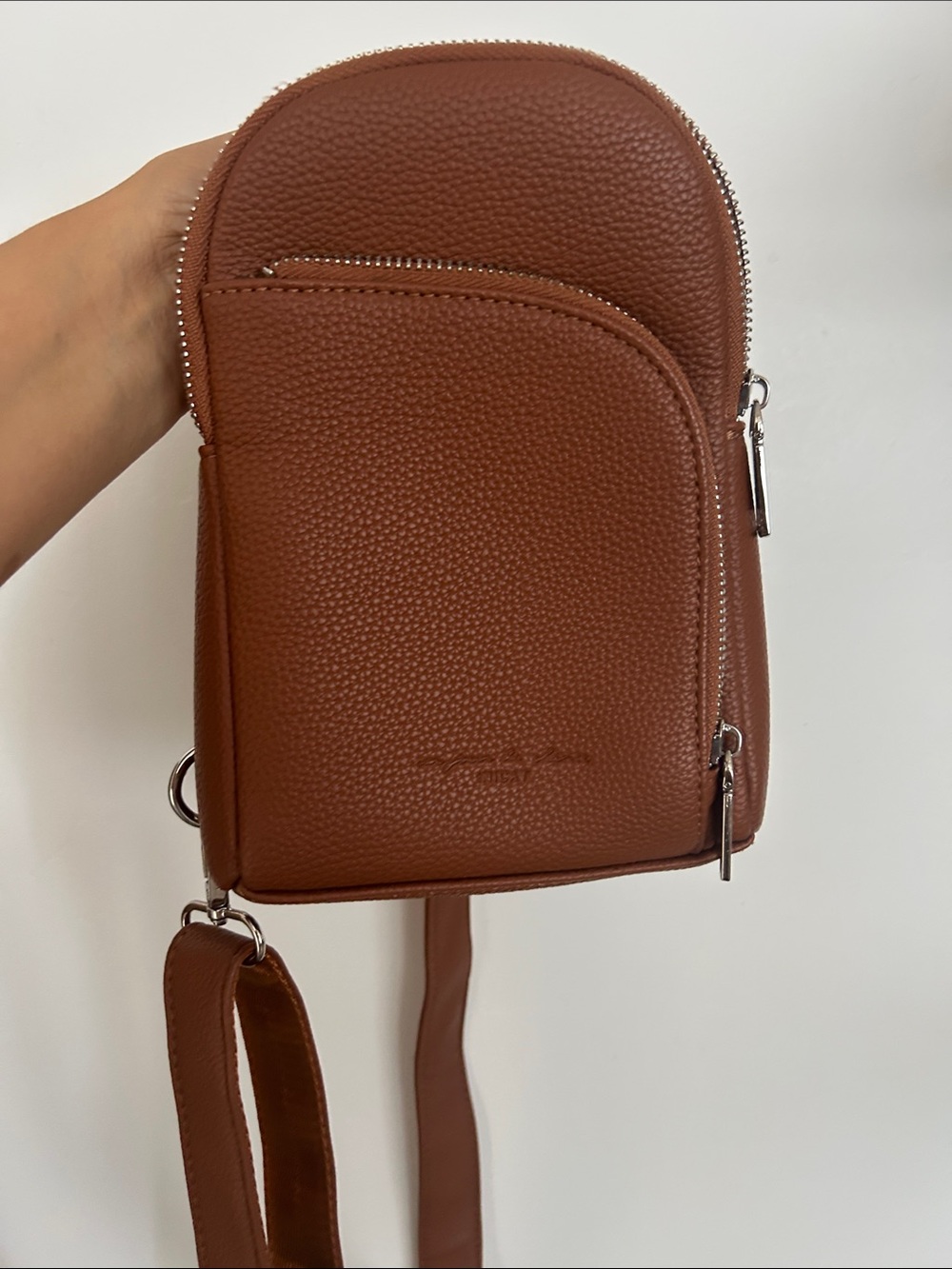 Pebbled Leather Crossbody Sling Bag in Cognac